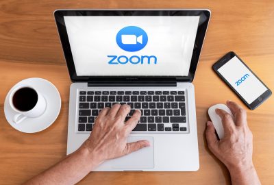 Antalya, TURKEY - May 28, 2020. Smart phone and computer showing Zoom Cloud Meetings app logo.